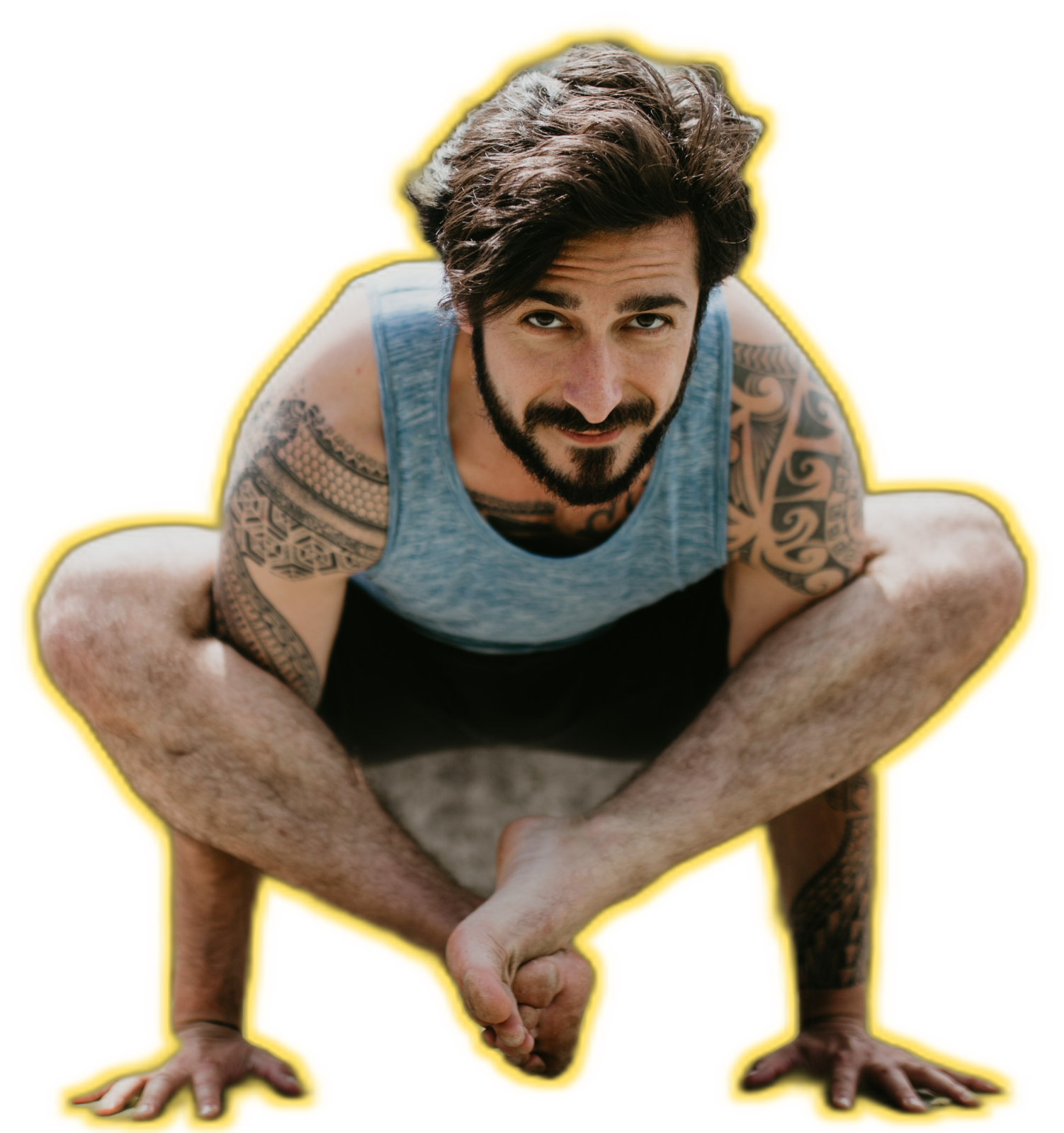 Peter Walters in a yogi squat, hands at heart center